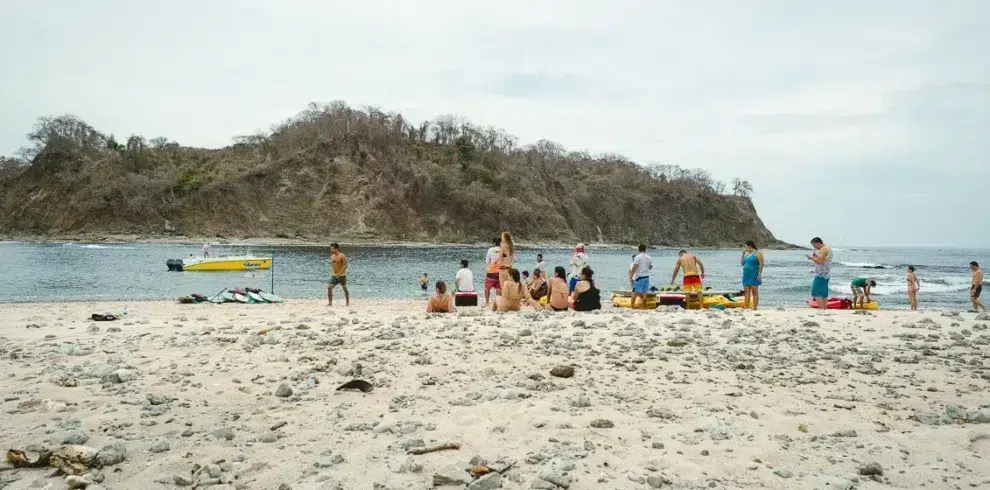 Group of people standing on the beach Costa Rica